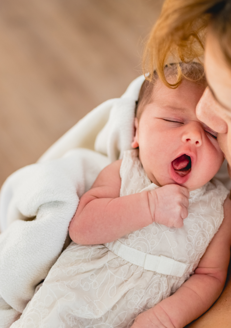 Overprikkelde baby laten slapen